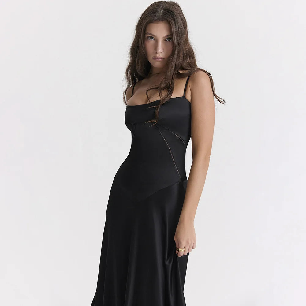 Woman wearing a black dress on a white background